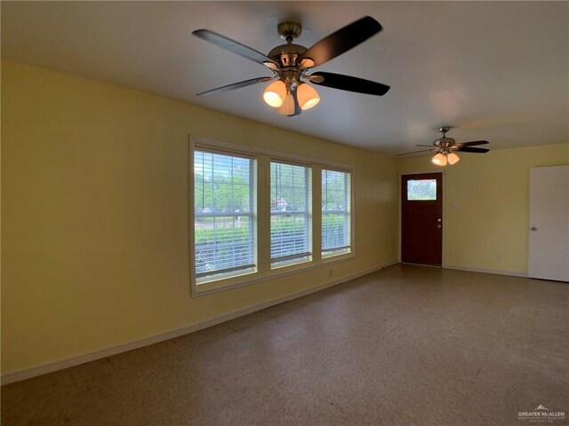205 W Beck St, Harlingen, TX 78550 - empty room with a ceiling fan