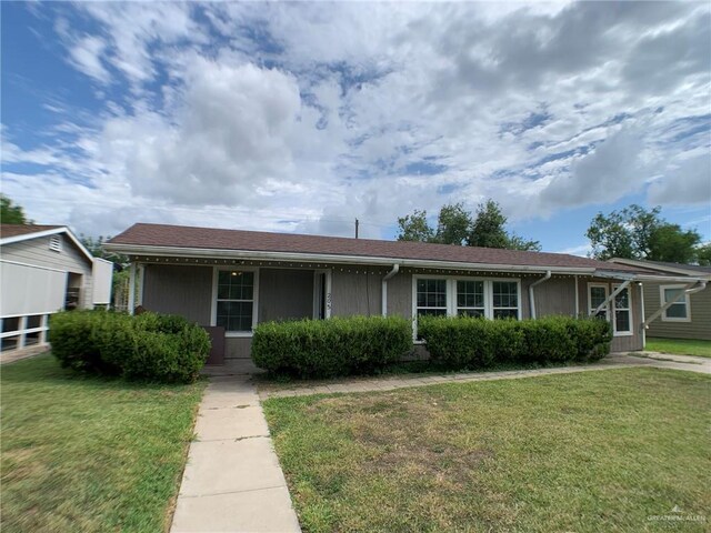 205 W Beck St, Harlingen, TX 78550 - view of front of home featuring a front lawn