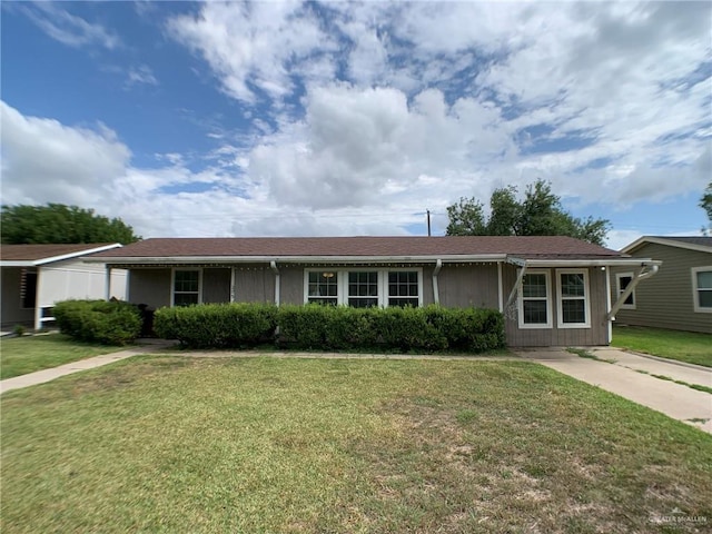 205 W Beck St, Harlingen, TX 78550 - ranch-style house with a front lawn