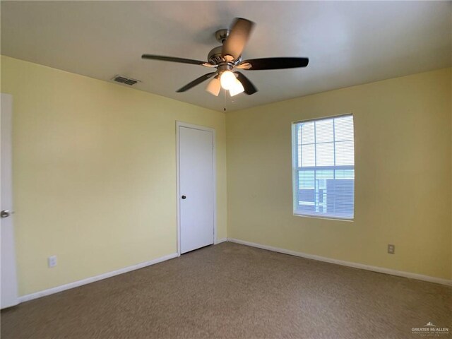 205 W Beck St, Harlingen, TX 78550 - carpeted spare room featuring a ceiling fan and baseboards