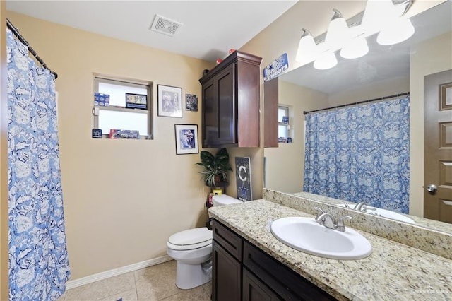3008 Brush Dr, Weslaco, TX 78599 - full bathroom with toilet, vanity, tile patterned floors, baseboards, and a shower with curtain