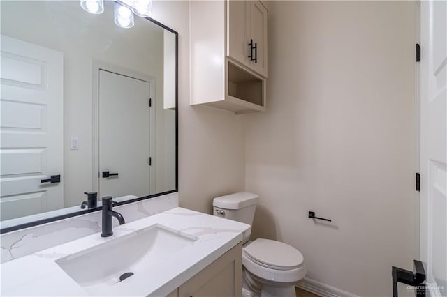 536 Pearl St, Edinburg, TX 78539 - bathroom featuring vanity and toilet