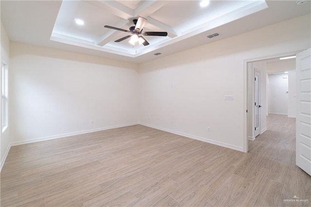 536 Pearl St, Edinburg, TX 78539 - empty room with coffered ceiling, ceiling fan, light wood-style flooring, beamed ceiling, and baseboards