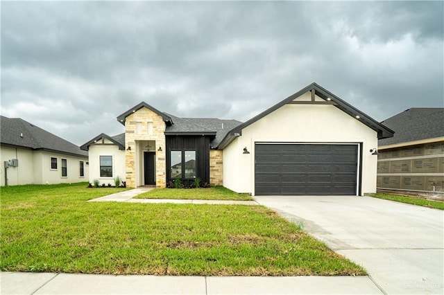 536 Pearl St, Edinburg, TX 78539 - view of front of house with stone siding, an attached garage, driveway, a front lawn, and stucco siding