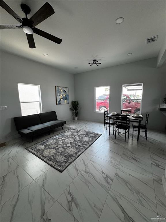 2809 Alpha Rd, Weslaco, TX 78596 - living room featuring marble finish floor, a ceiling fan, recessed lighting, and visible vents