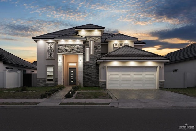 view of front of property featuring a garage