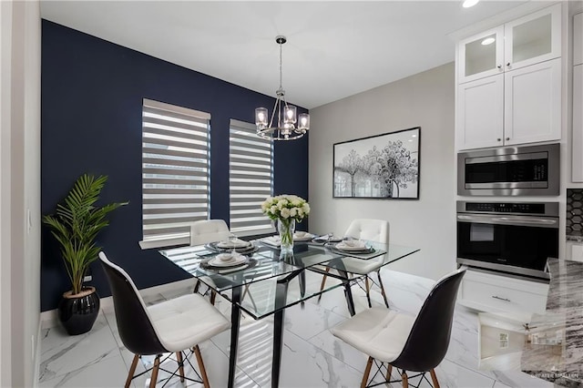 dining room featuring an inviting chandelier