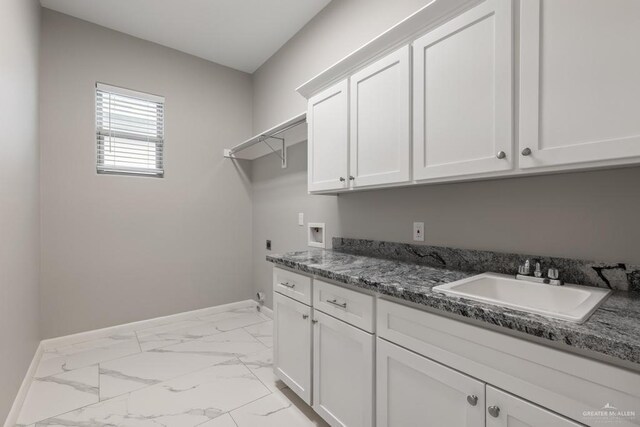 laundry room with sink, cabinets, hookup for a washing machine, and electric dryer hookup