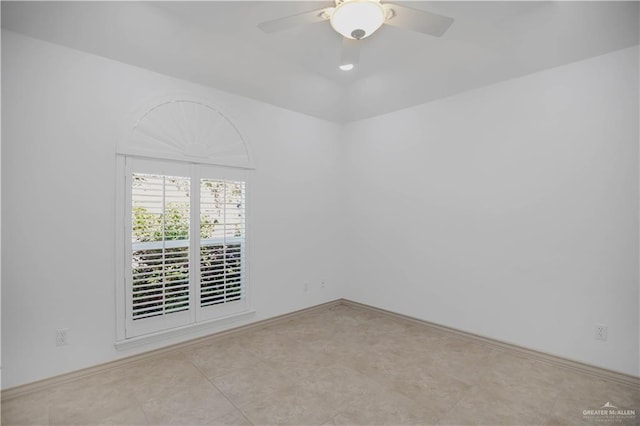 spare room featuring ceiling fan