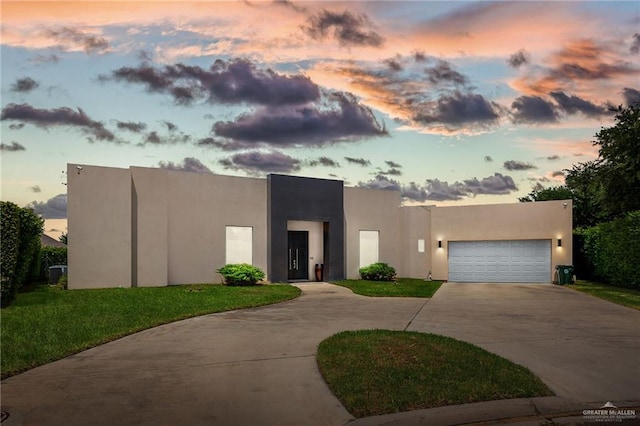 pueblo-style home with a garage