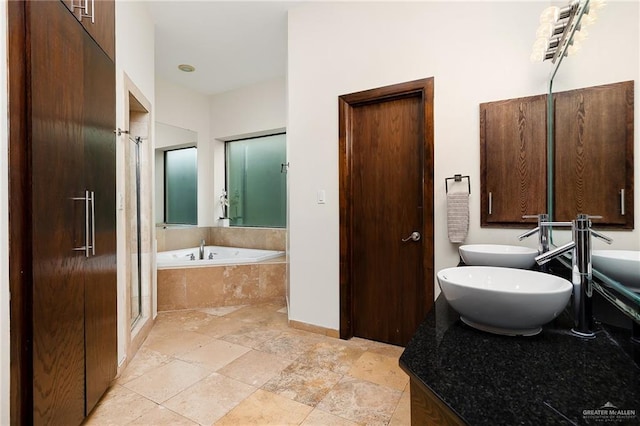 bathroom with plus walk in shower and sink