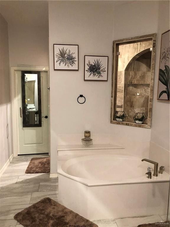 bathroom featuring a bathtub