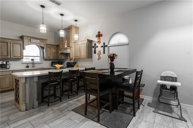 dining area featuring sink