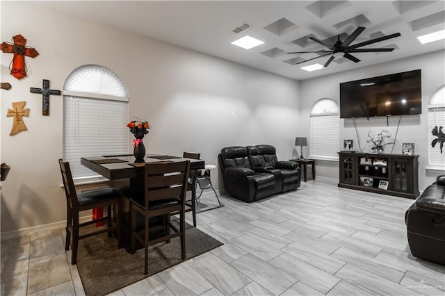 dining space with ceiling fan