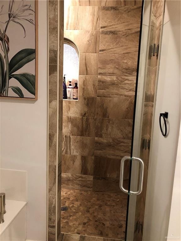 bathroom featuring walk in shower