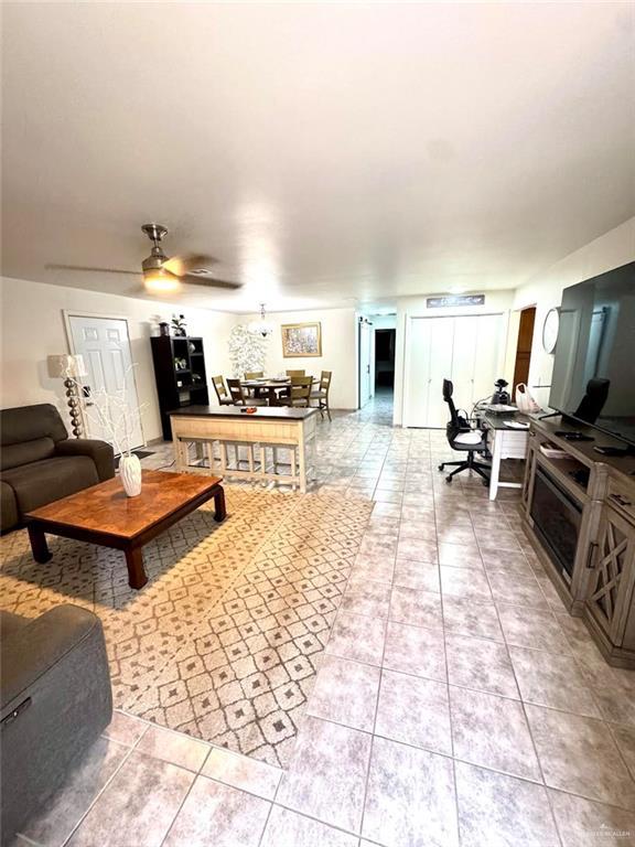 living area with light tile patterned floors