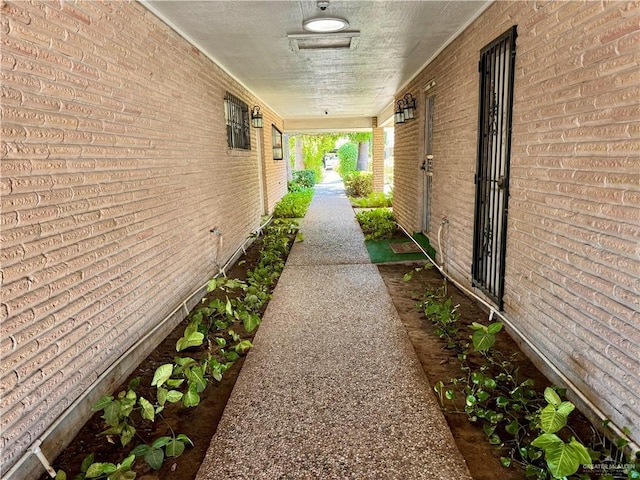 exterior space with brick siding