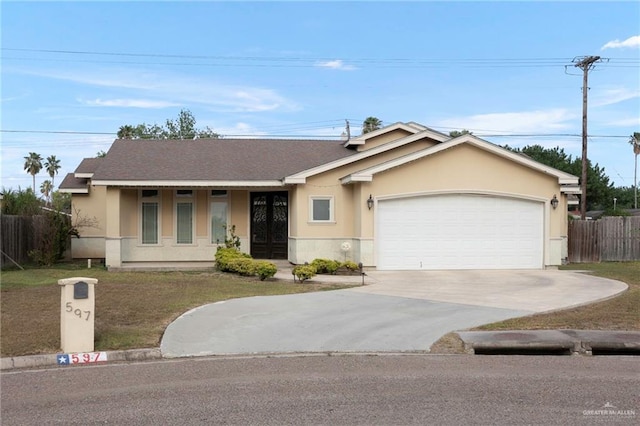 single story home with a front lawn and a garage