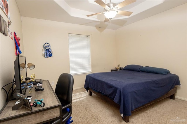 907 Amethyst Dr, Weslaco, TX 78596 - bedroom featuring light carpet, baseboards, a desk, and a ceiling fan