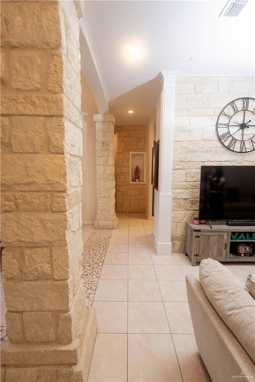 907 Amethyst Dr, Weslaco, TX 78596 - corridor with light tile patterned floors and ornate columns