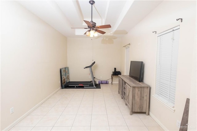 907 Amethyst Dr, Weslaco, TX 78596 - exercise room with a raised ceiling, a ceiling fan, and light tile patterned floors