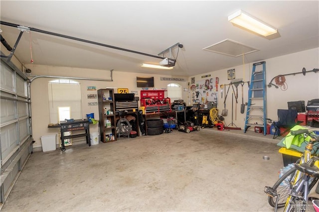 907 Amethyst Dr, Weslaco, TX 78596 - garage featuring a garage door opener