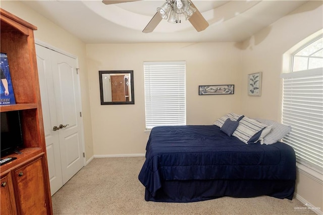 907 Amethyst Dr, Weslaco, TX 78596 - bedroom with carpet floors, baseboards, and a ceiling fan