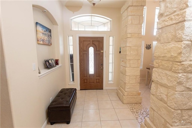 907 Amethyst Dr, Weslaco, TX 78596 - entrance foyer with healthy amount of natural light and light tile patterned floors