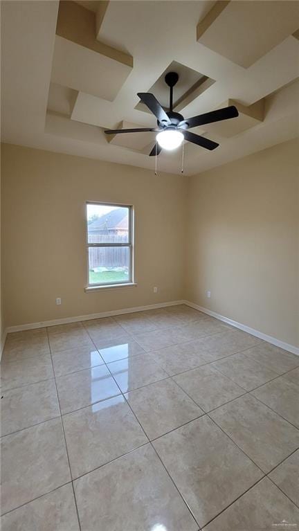 empty room featuring ceiling fan and light tile patterned flooring