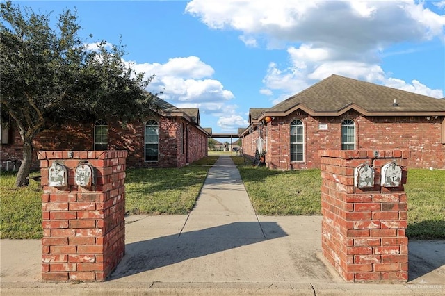 view of home's exterior with a yard