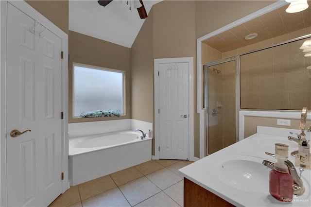 bathroom featuring tile patterned flooring, vanity, lofted ceiling, and shower with separate bathtub