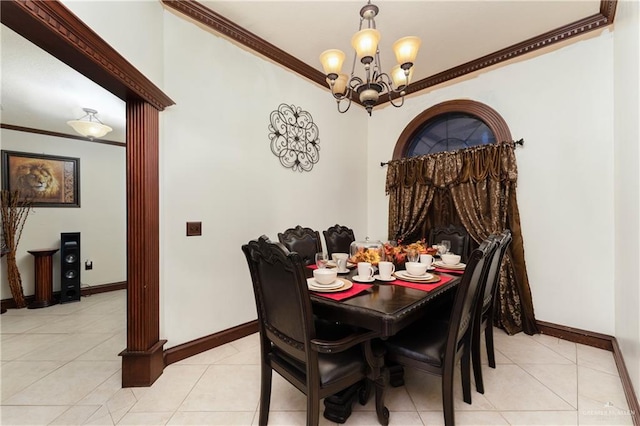 dining room featuring light tile patterned flooring, a notable chandelier, and ornamental molding