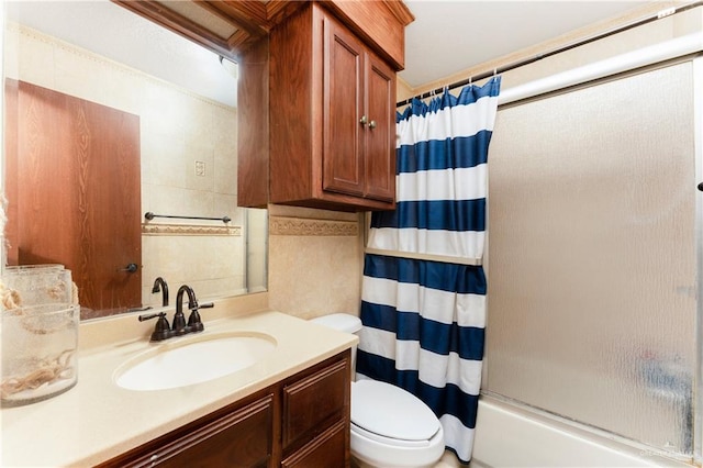 full bathroom featuring vanity, toilet, and shower / bathtub combination with curtain