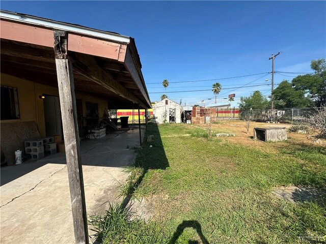 view of yard featuring a carport