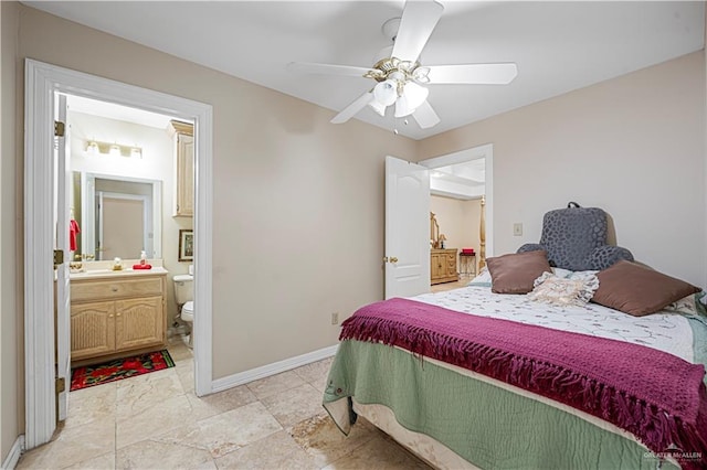 bedroom featuring ceiling fan and ensuite bathroom