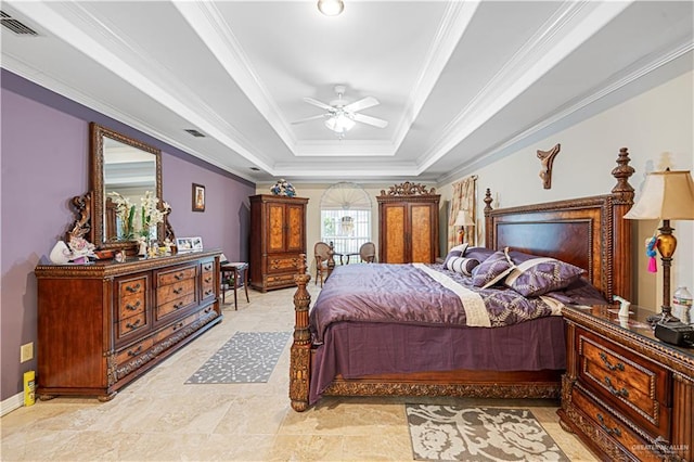 bedroom with ceiling fan, crown molding, and a tray ceiling