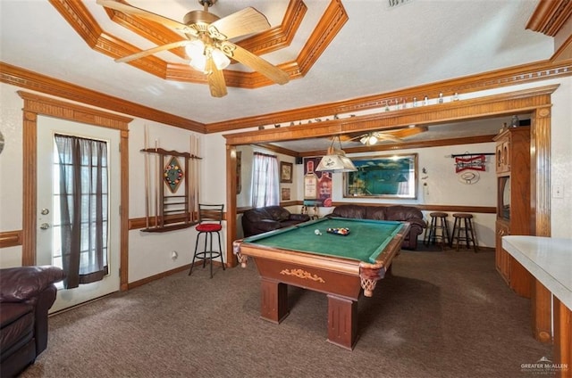 game room featuring a tray ceiling, ceiling fan, and ornamental molding