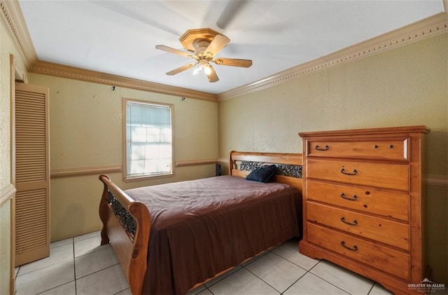 bedroom with crown molding, ceiling fan, and light tile patterned floors