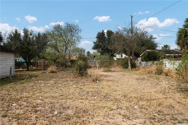 view of yard featuring fence