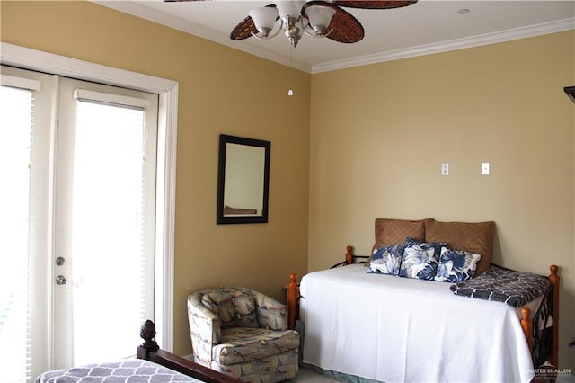 131 E Saturn Ln Unit 3, South Padre Island, TX 78597 - bedroom featuring crown molding and ceiling fan