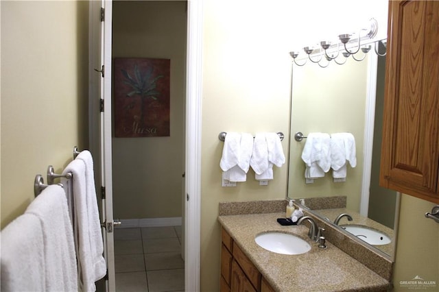 131 E Saturn Ln Unit 3, South Padre Island, TX 78597 - bathroom with vanity and tile patterned floors