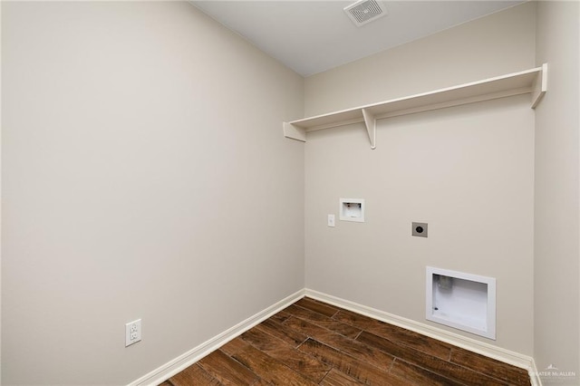 laundry room with hookup for a washing machine, electric dryer hookup, and dark hardwood / wood-style floors