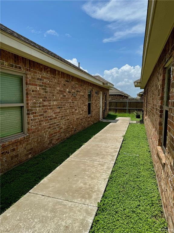 view of yard with a patio and fence