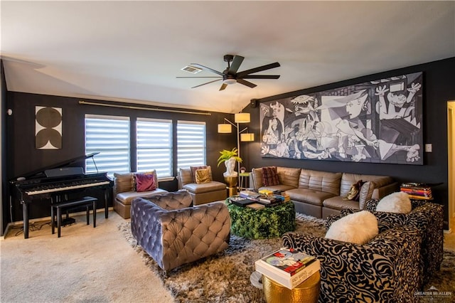 living room featuring carpet flooring and ceiling fan