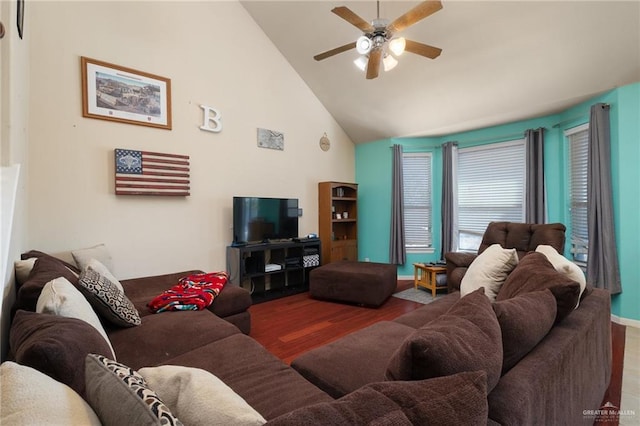 living room featuring wood-type flooring, high vaulted ceiling, and ceiling fan