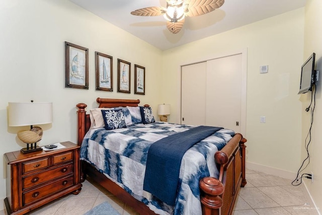 310 Padre Blvd Unit 2306, South Padre Island, TX 78597 - bedroom featuring light tile patterned floors, a closet, and ceiling fan