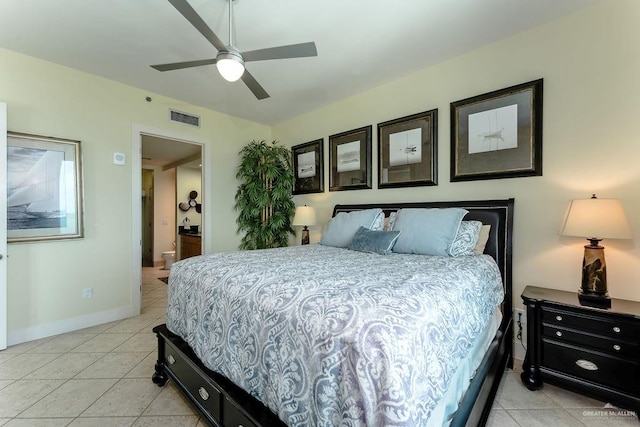 bedroom with ceiling fan and light tile patterned flooring