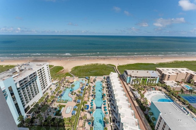 bird's eye view featuring a water view and a view of the beach