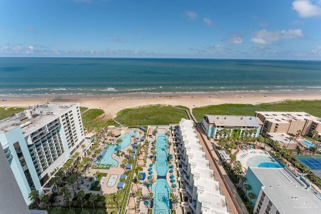 bird's eye view featuring a water view and a view of the beach