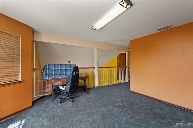 carpeted home office with visible vents